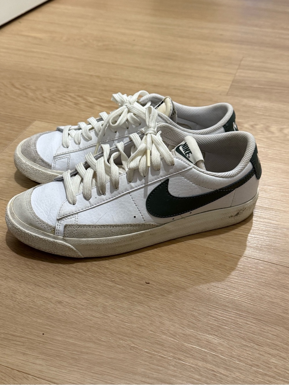 Nike Men’s White Sneakers with Dark Green Swoosh